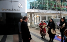 TransCanada representatives meet with indigenous activists on the steps of their head office in Calgary, AB.
