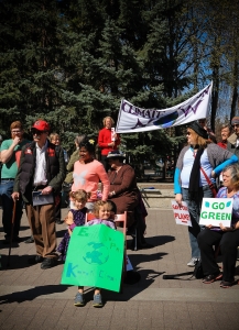 Children holding save the earth signs. April 26-2015 yyc